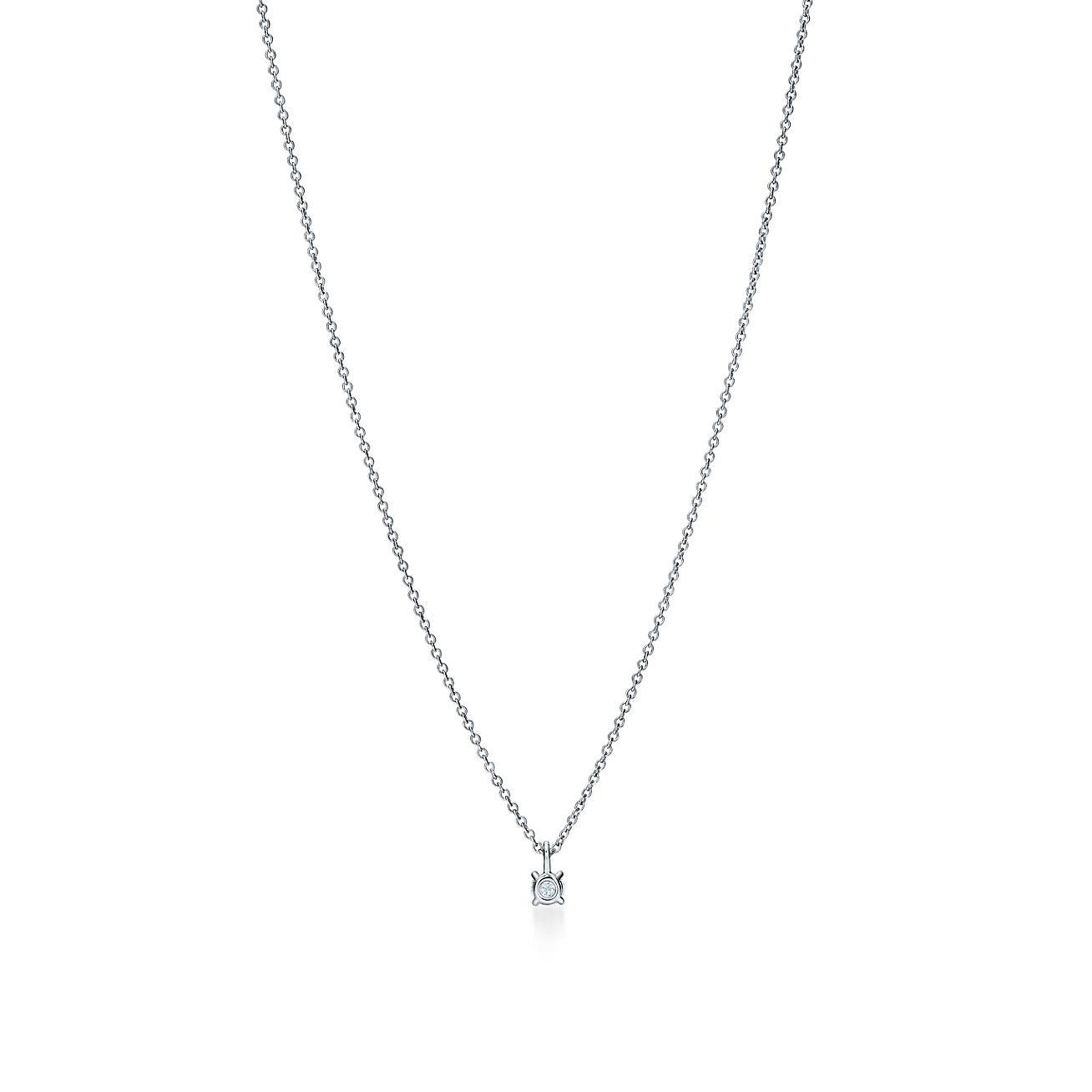 TIFFANY SOLITAIRE DIAMOND PENDANT IN PLATINUM